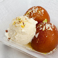 Hot gulab jamun with ice cream